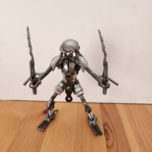 Nuts and Bolts Metal Predator Figure
